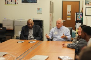 Cedric Golden (left) and Kirk Bohls (right) discuss journalism with students.