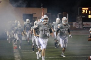 The Warriors make their way back to the field at the end of the halftime show.