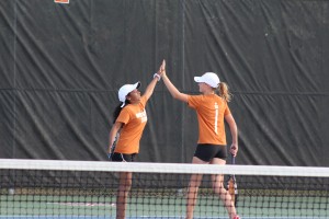 Pritika Paramasivann '19 and Carolien van Heemskerck '19 celebrate their excellent match.