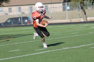 Luca Mazzola '19 looks to run ahead around several Stony Point defenders.