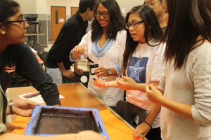 Students create shirts at Pre-IBSO event on Oct. 18.