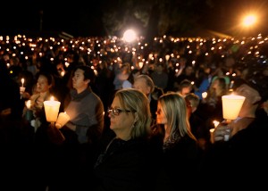 Members of the Roseburg Community hold a vigil for the victims of the Oct. 1 shooting. (Photo via ABC7)