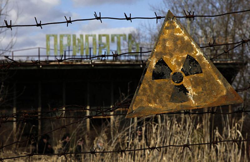 A barbed wire fence guards Chernobyl from visitors.