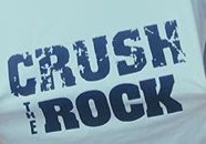 Lady Warriors wear Crush the Rock shirts in celebration of their win.