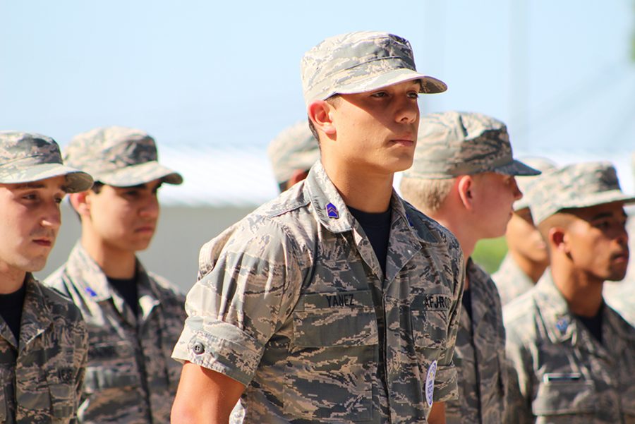Troy Yanez 18 stands in formation alongside other cadets.