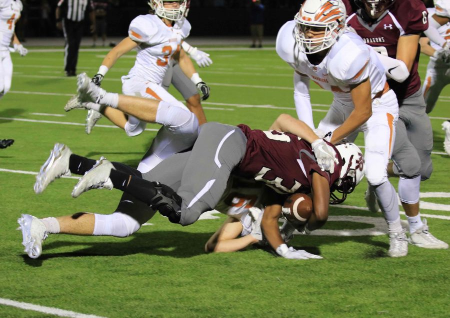Beau Brown ‘17 tackles a Round Rock player.