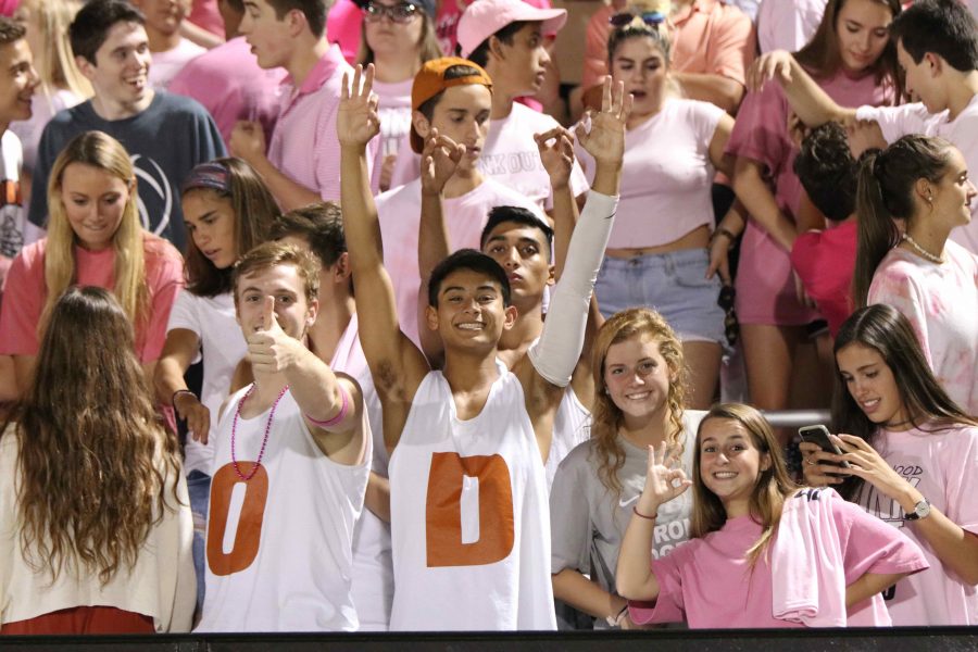 Student section wears all pink in support for breast cancer awareness month.