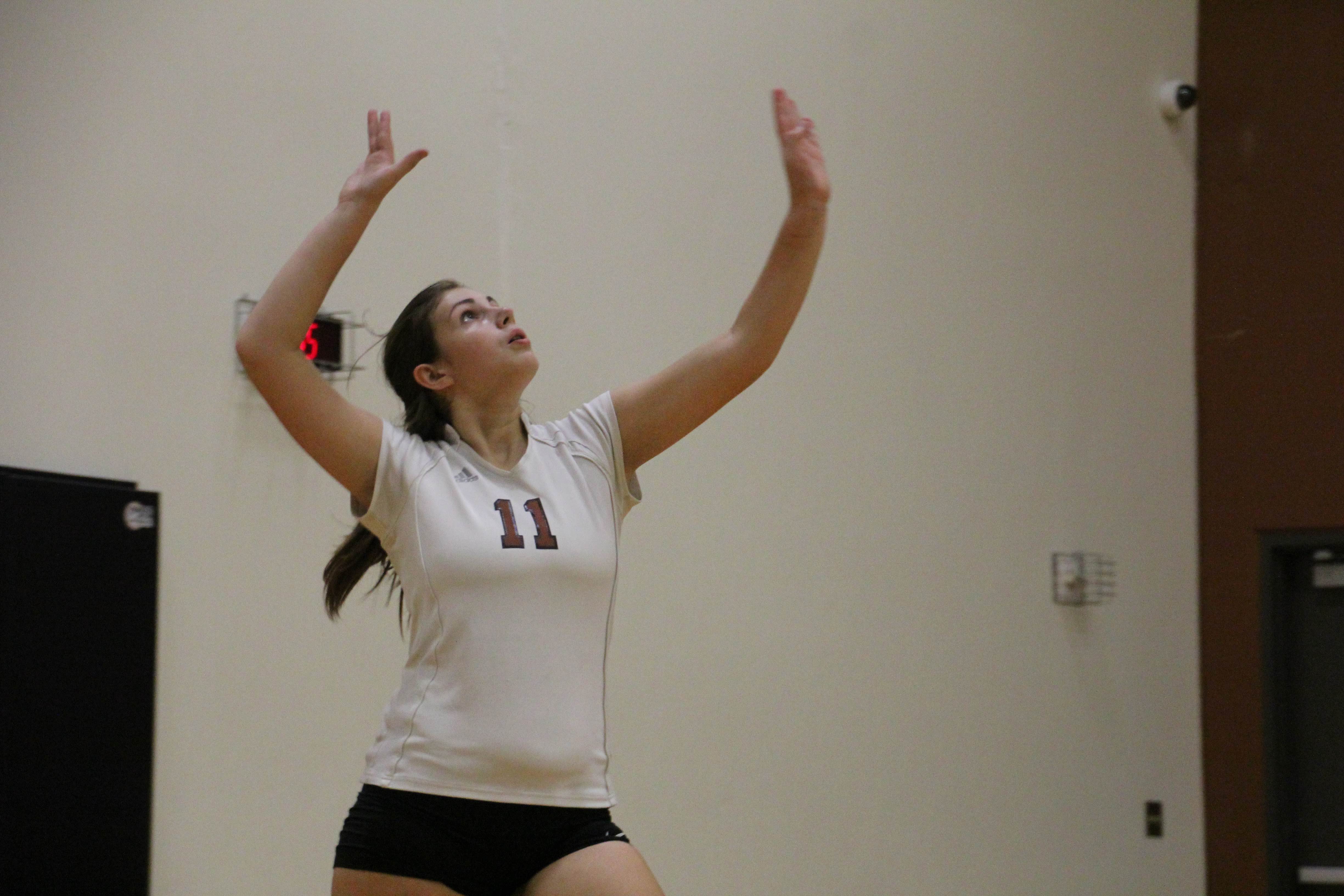 JV White Volleyball Succeeds Over McNeil in Dig Pink Game