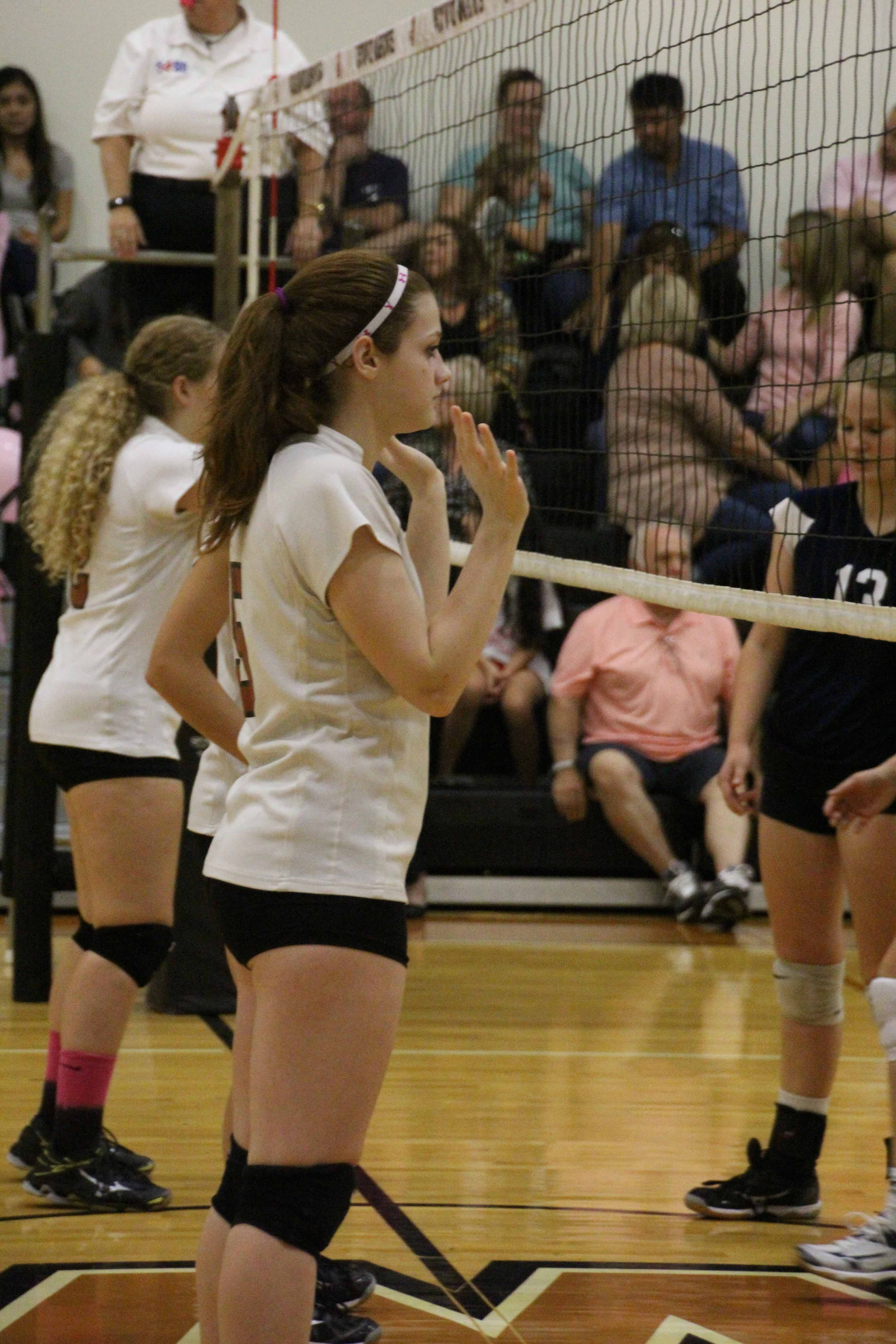 JV White Volleyball Succeeds Over McNeil in Dig Pink Game