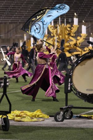 Color guard member waving her flag during the second movement of the show. 