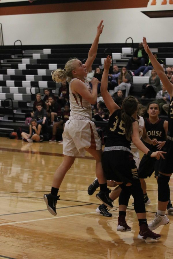 Christie French 19 follows through with her layup. 
