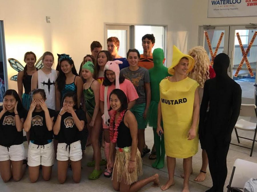 The team dons their costumes before they swim. Photo courtesy of Westwood Swim and Dive.