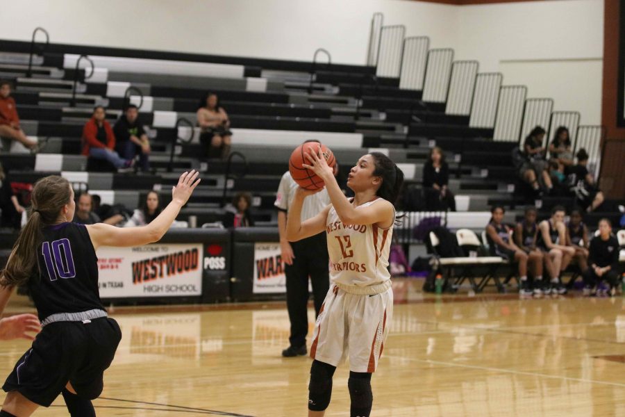 Annalise Galliguez ‘20 steps up for a three-pointer. 