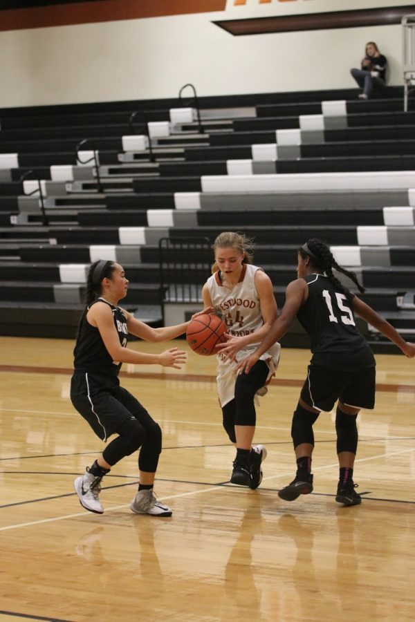 Jenny Todd 17 dribbles past Bowie defenders.