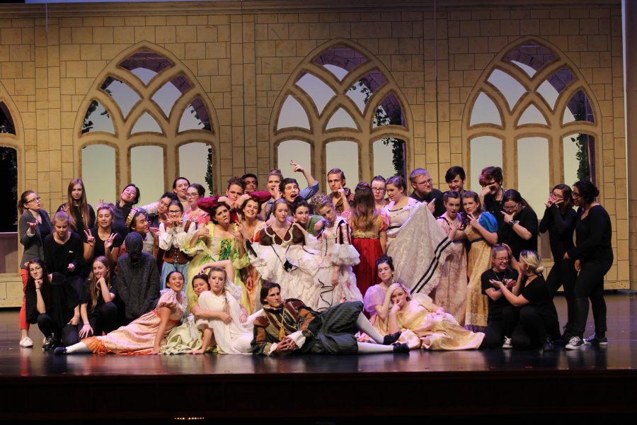 The cast and crew strike a pose after curtain call.