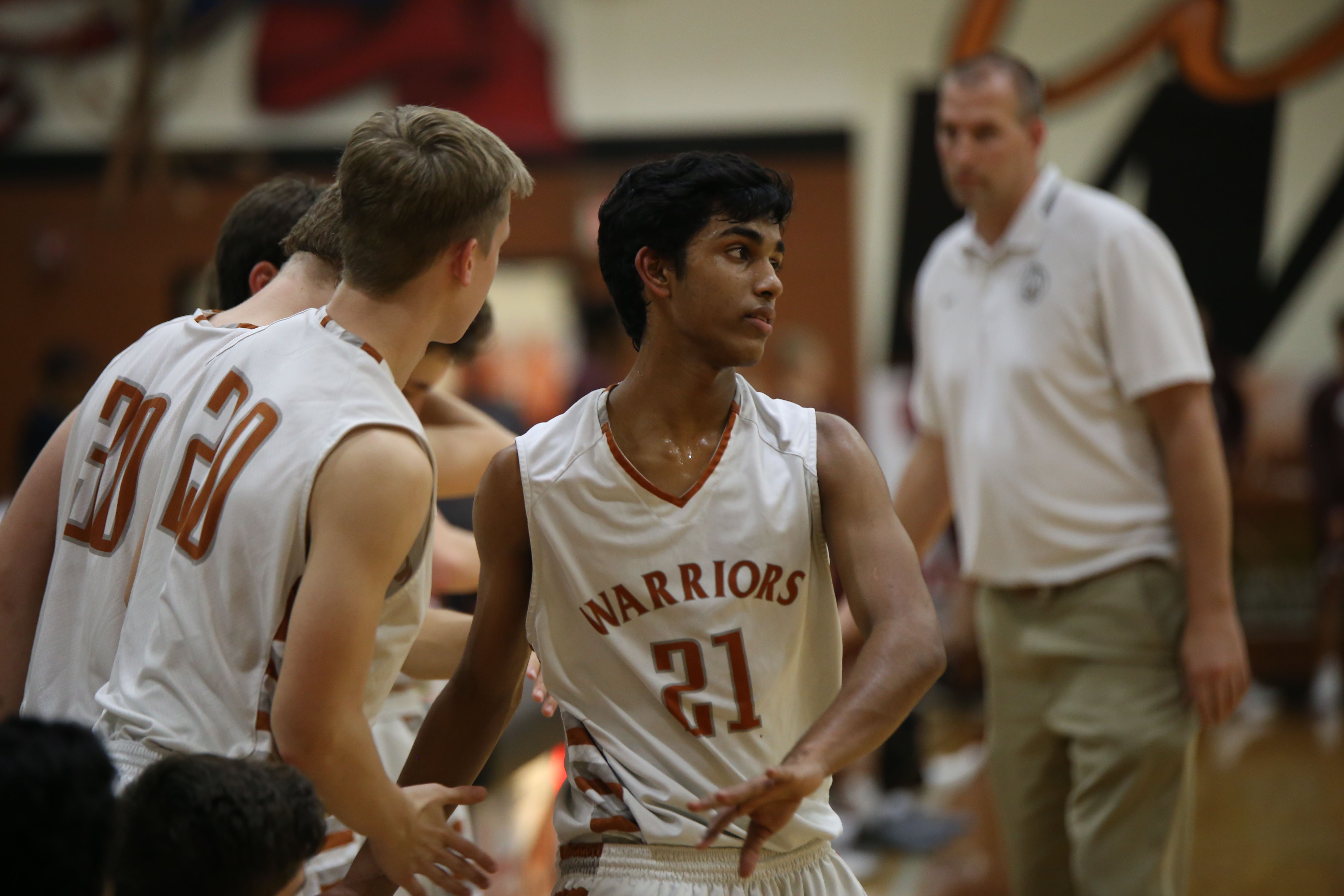 JV Boys' Basketball Defeats RR Dragons in 3OT