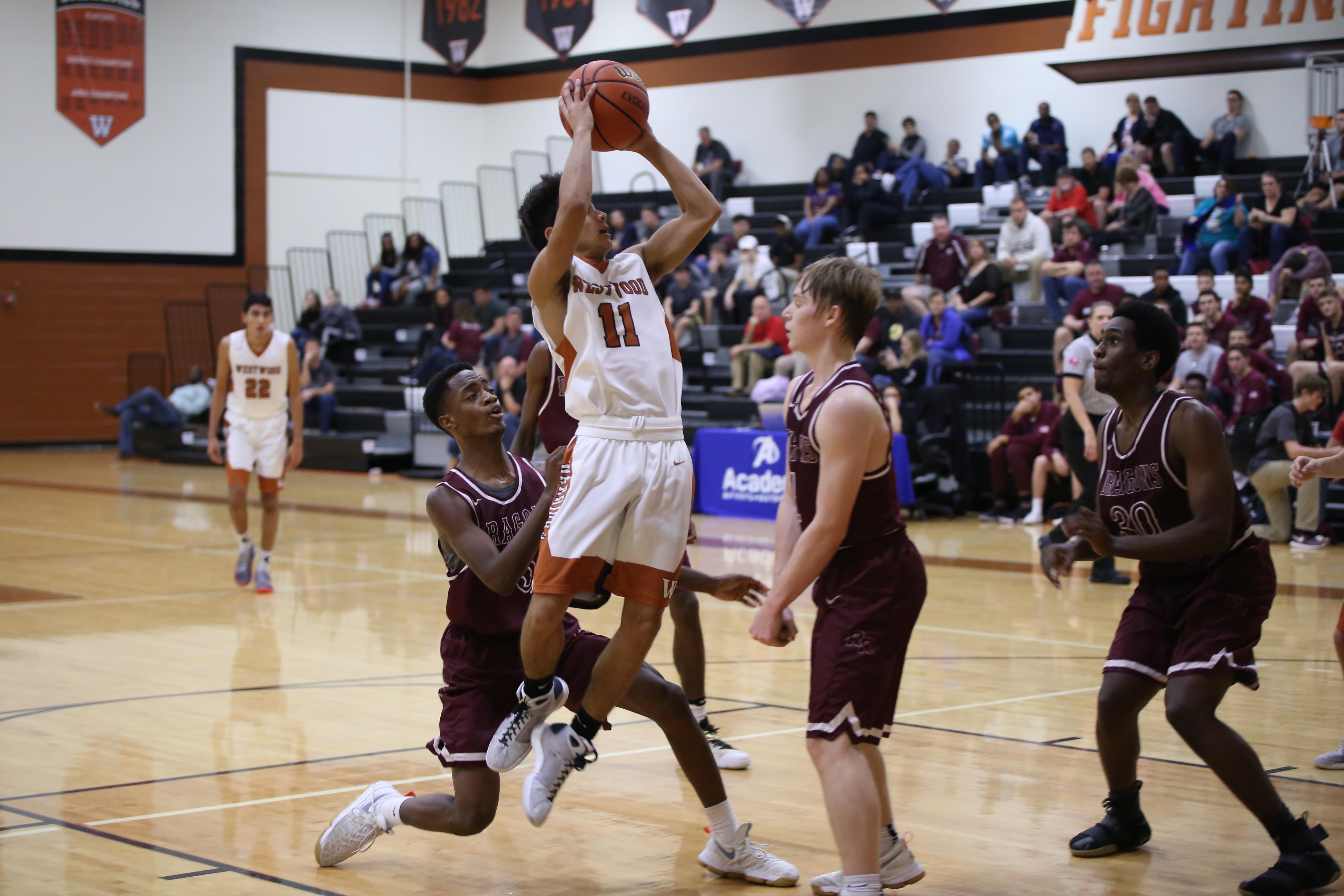 Varsity Boys' Basketball Conquers the RR Dragons 62-37