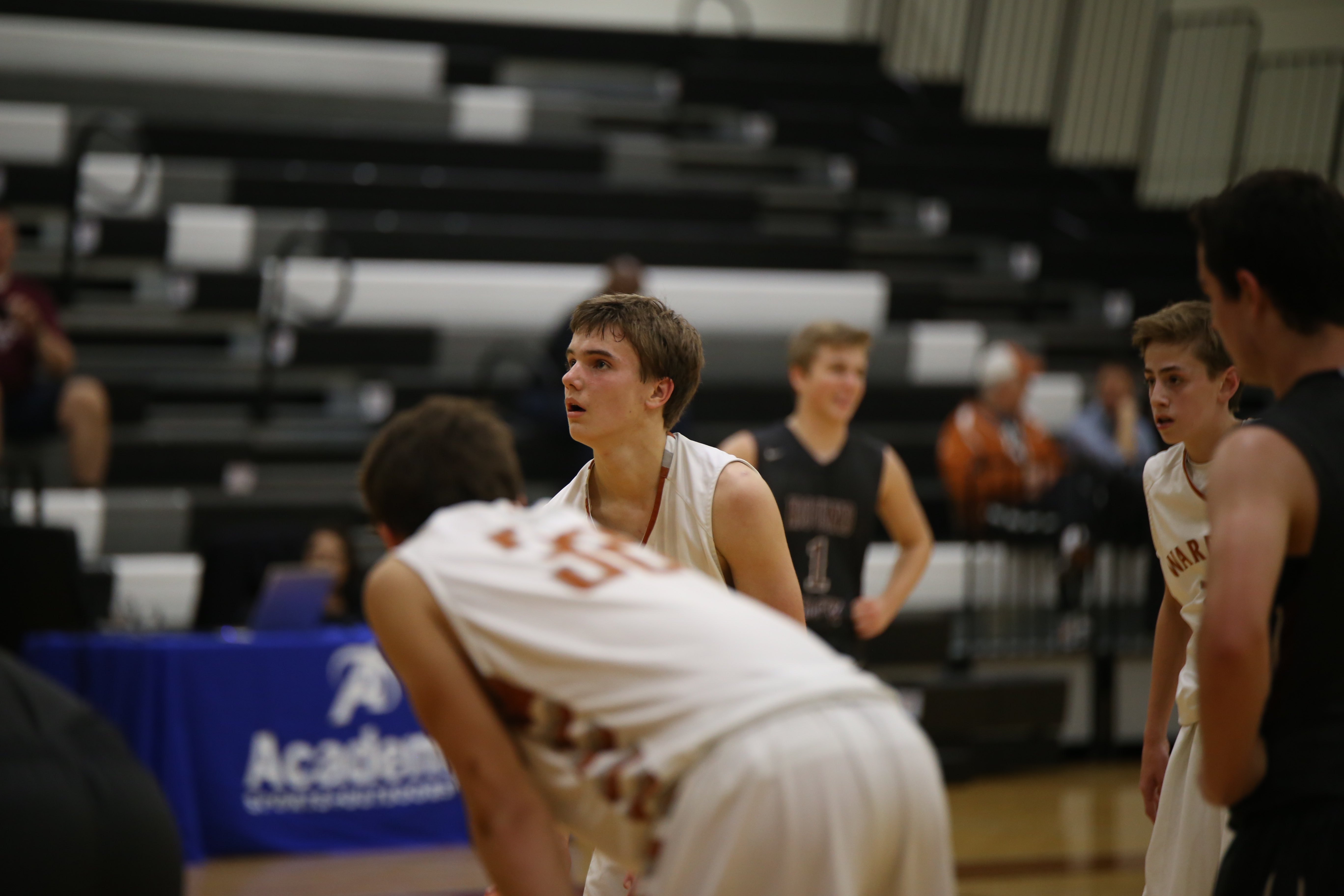 JV Boys' Basketball Defeats RR Dragons in 3OT