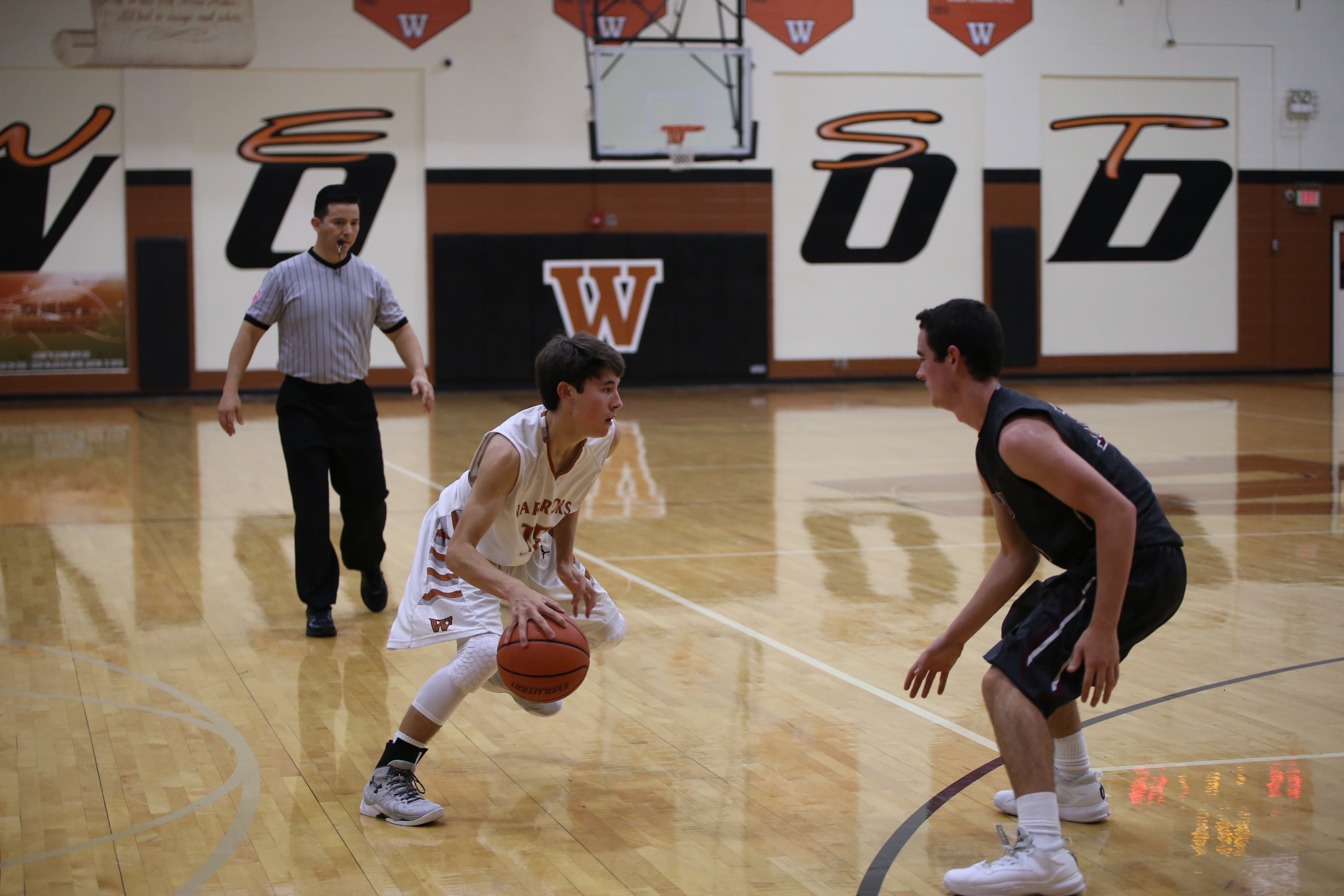 JV Boys' Basketball Defeats RR Dragons in 3OT