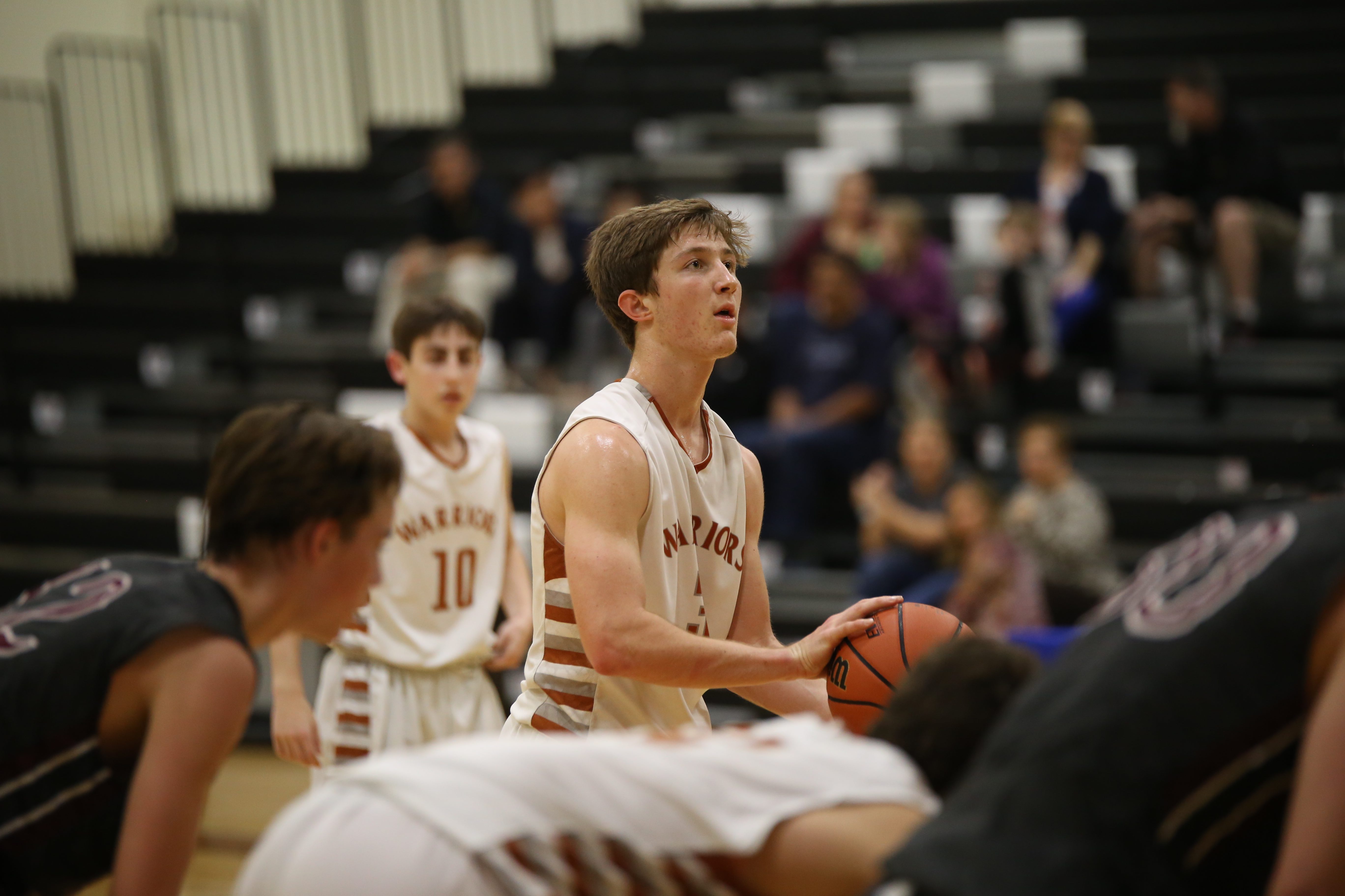 JV Boys' Basketball Defeats RR Dragons in 3OT