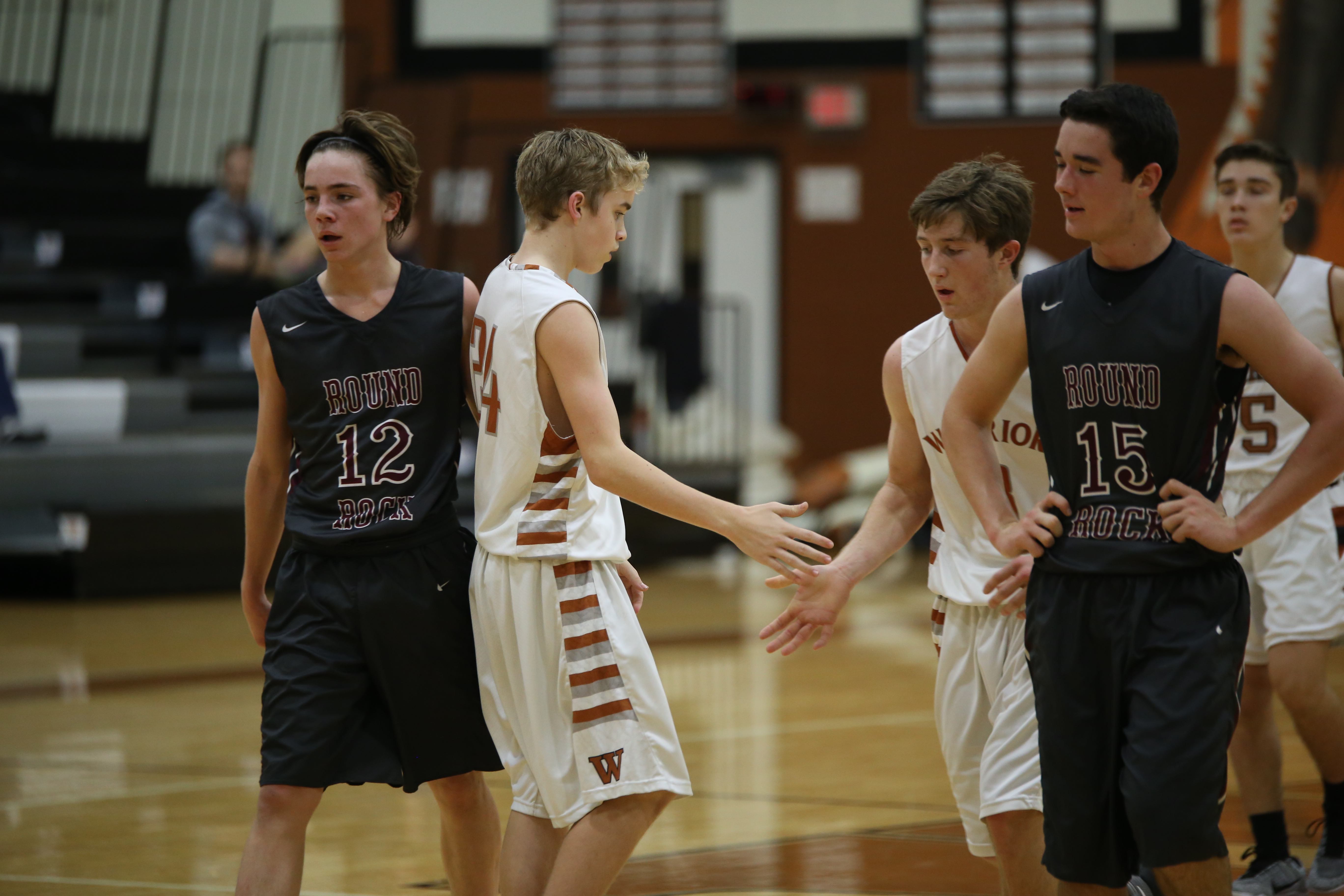 JV Boys' Basketball Defeats RR Dragons in 3OT