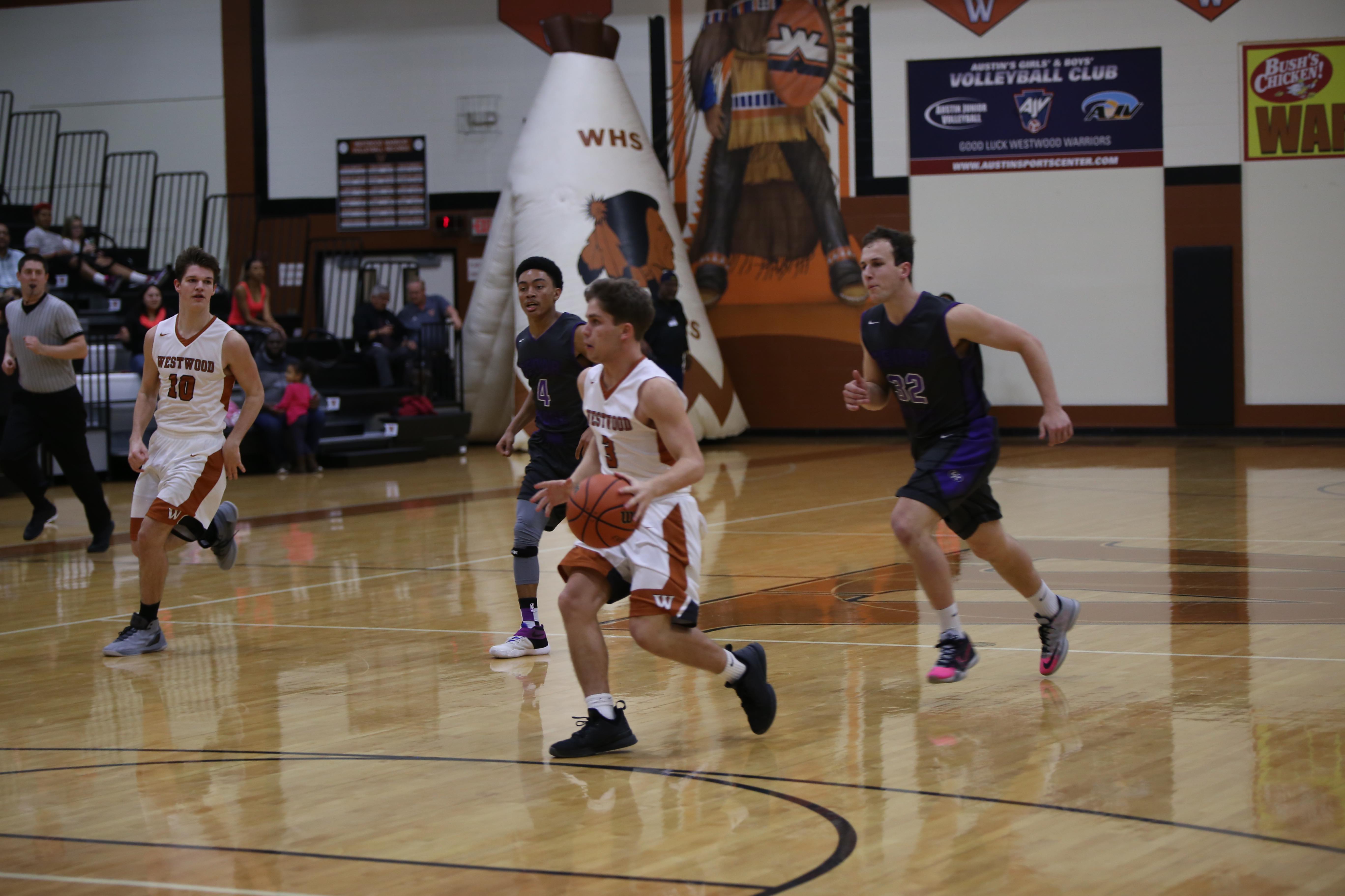 GALLERY: Varsity Boys' Basketball Falls to Cedar Ridge 39-53