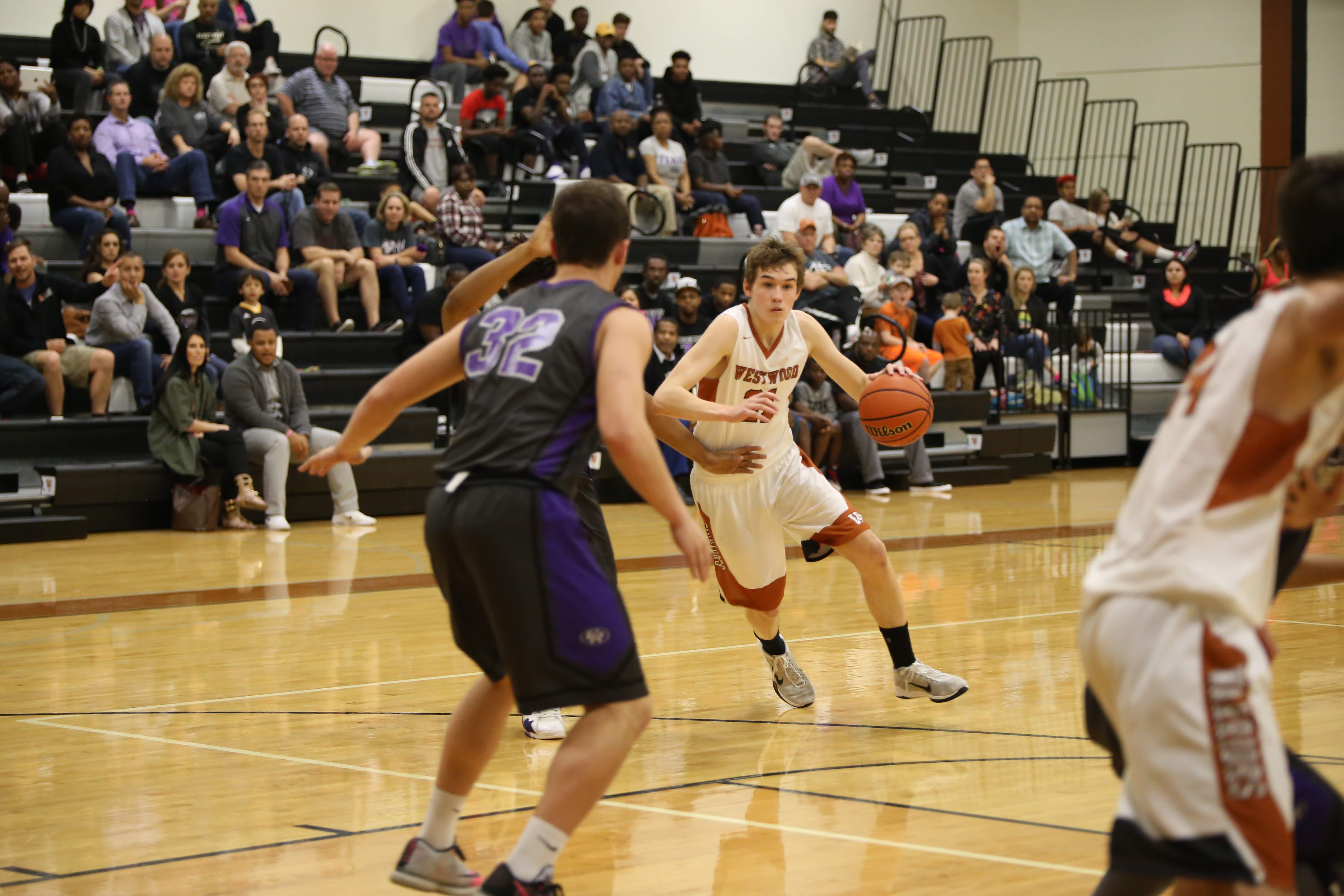 GALLERY: Varsity Boys' Basketball Falls to Cedar Ridge 39-53