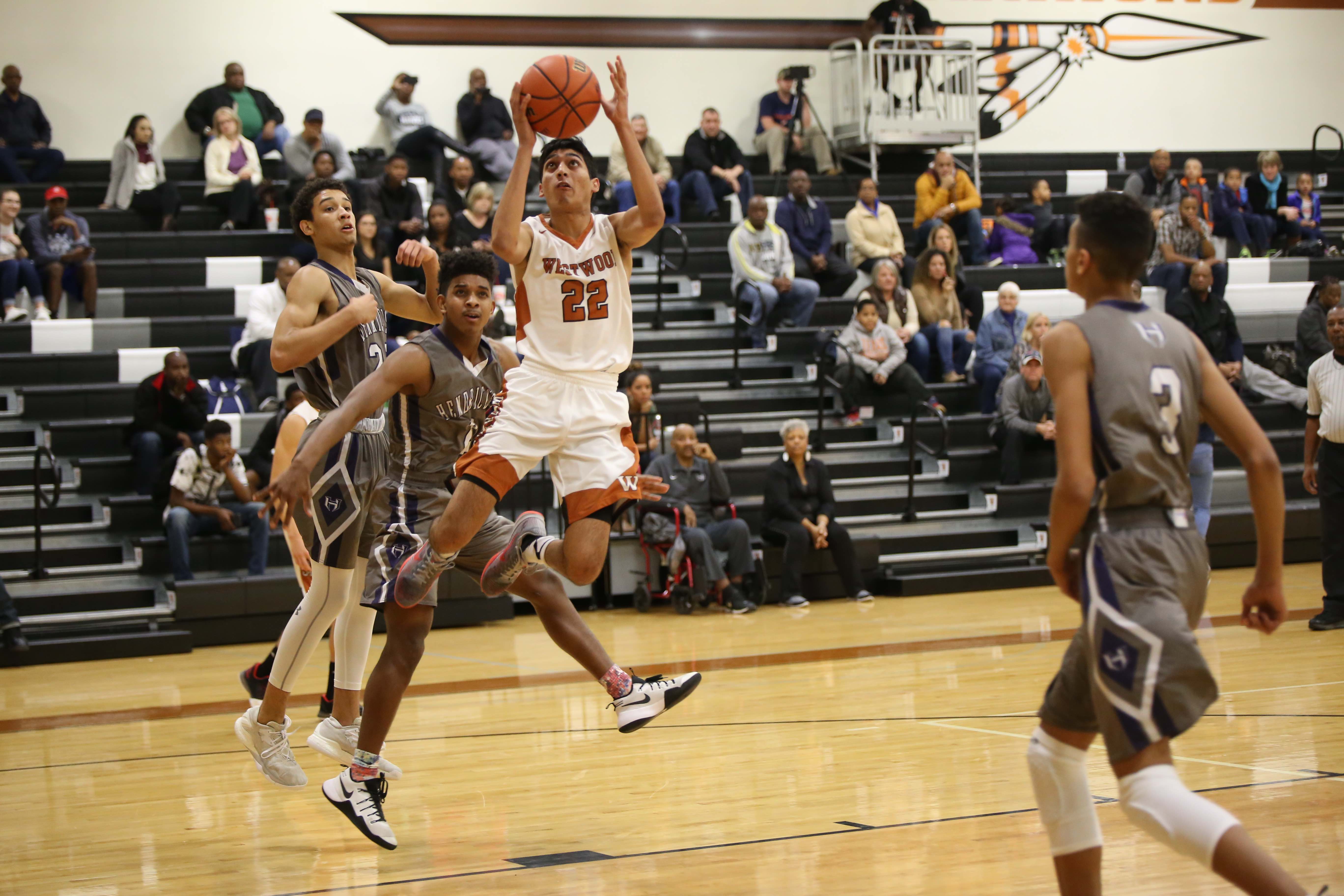 GALLERY: Varsity Boys' Basketball Falls Short Against Hendrickson