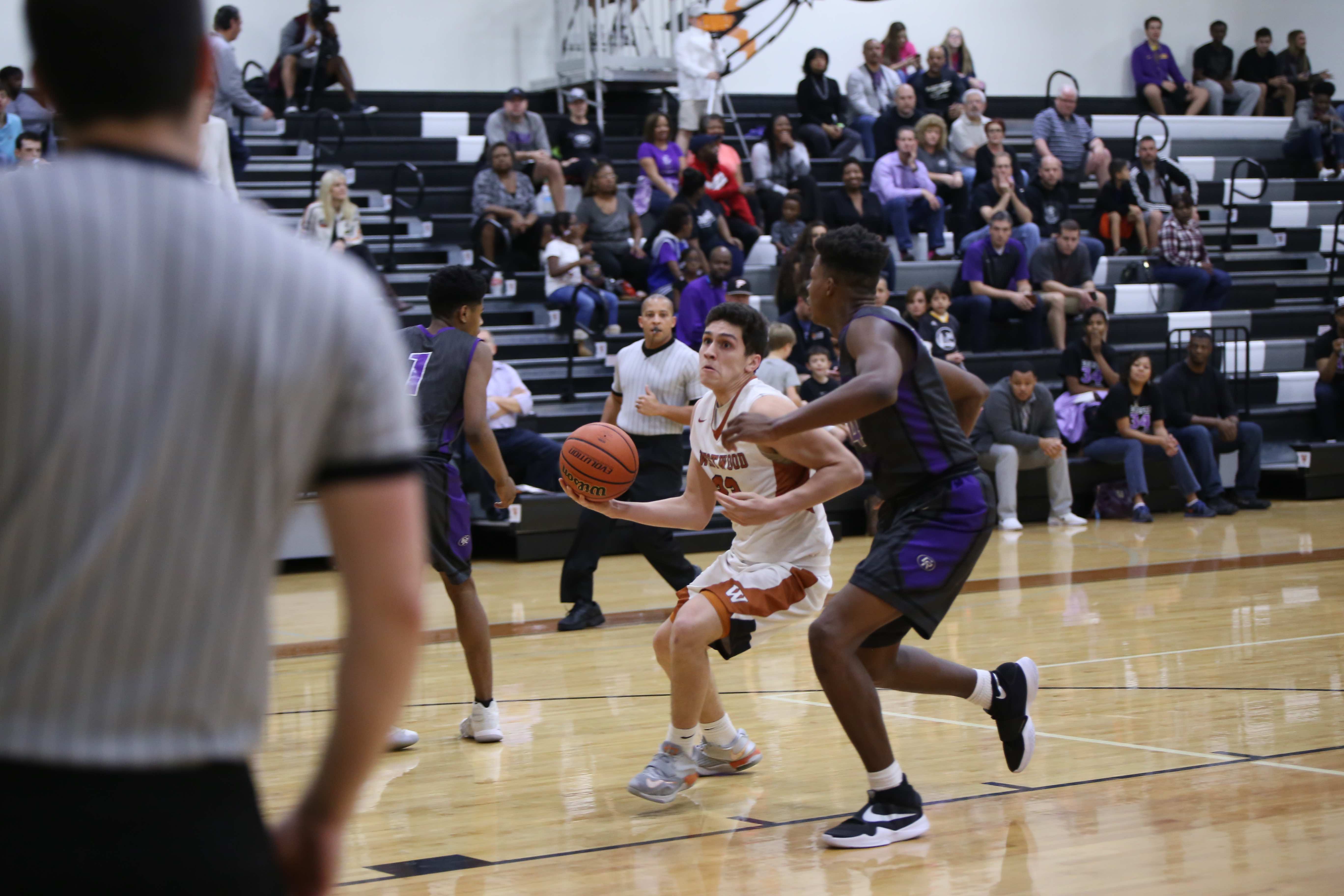 GALLERY: Varsity Boys' Basketball Falls to Cedar Ridge 39-53