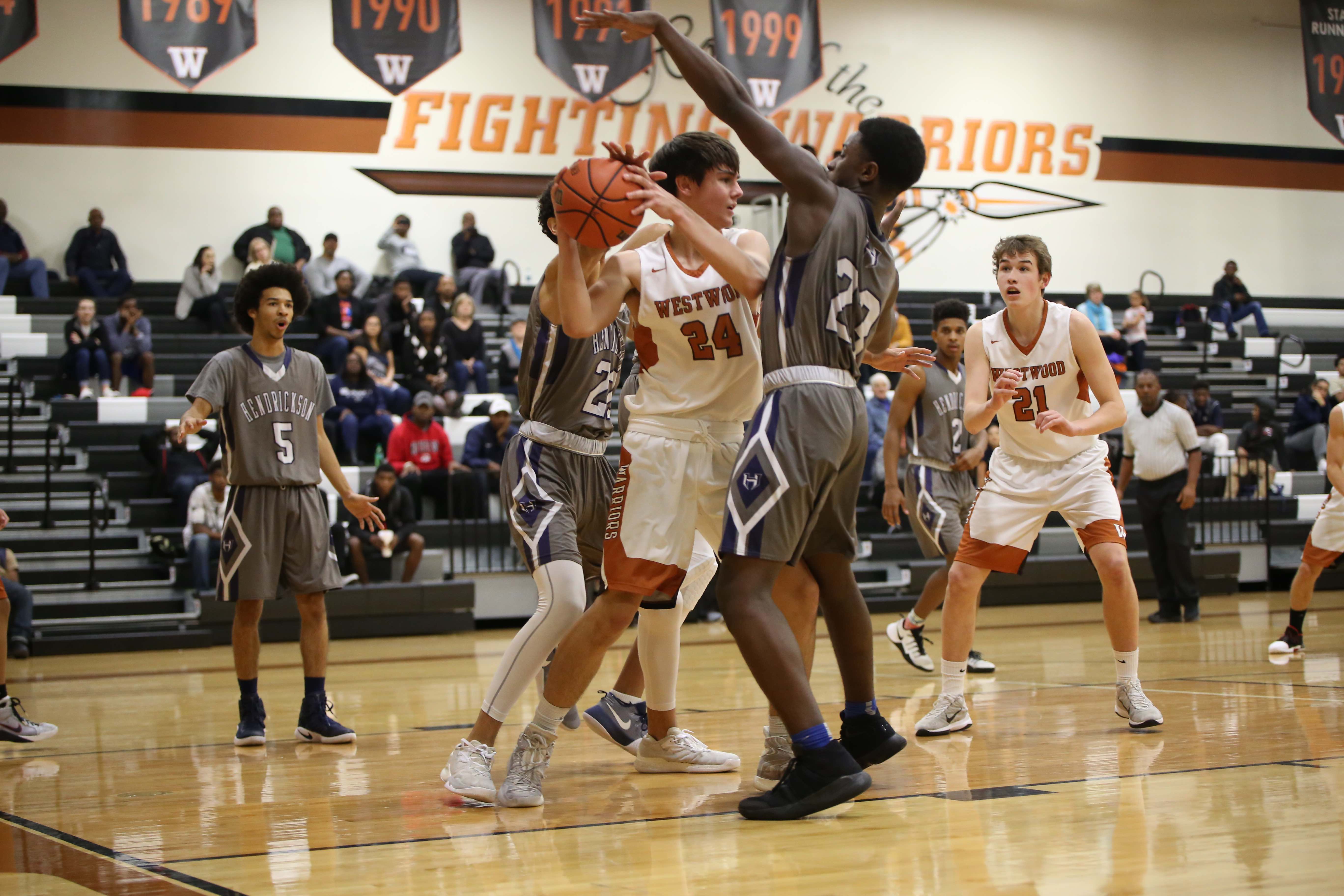 GALLERY: Varsity Boys' Basketball Falls Short Against Hendrickson