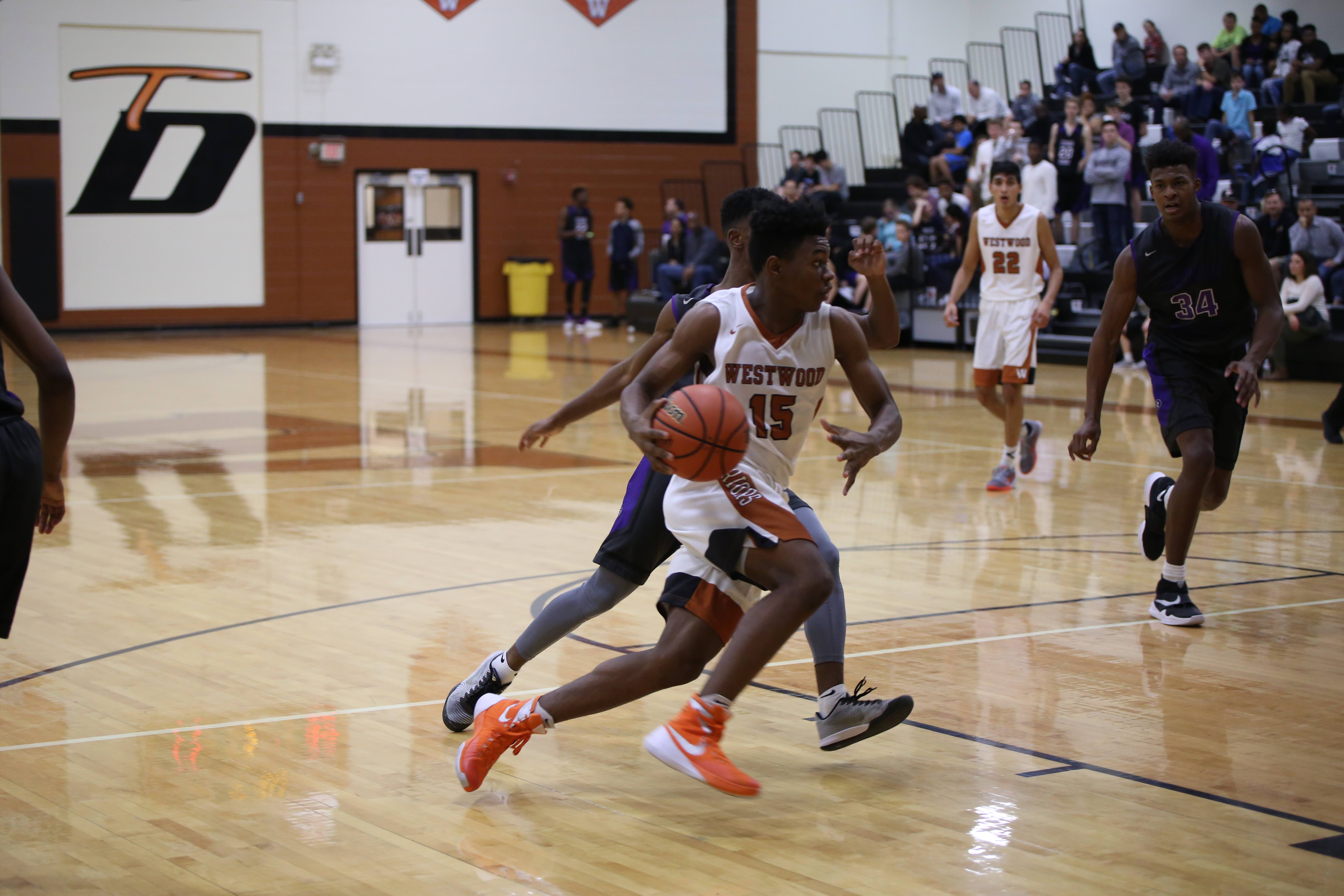 GALLERY: Varsity Boys' Basketball Falls to Cedar Ridge 39-53