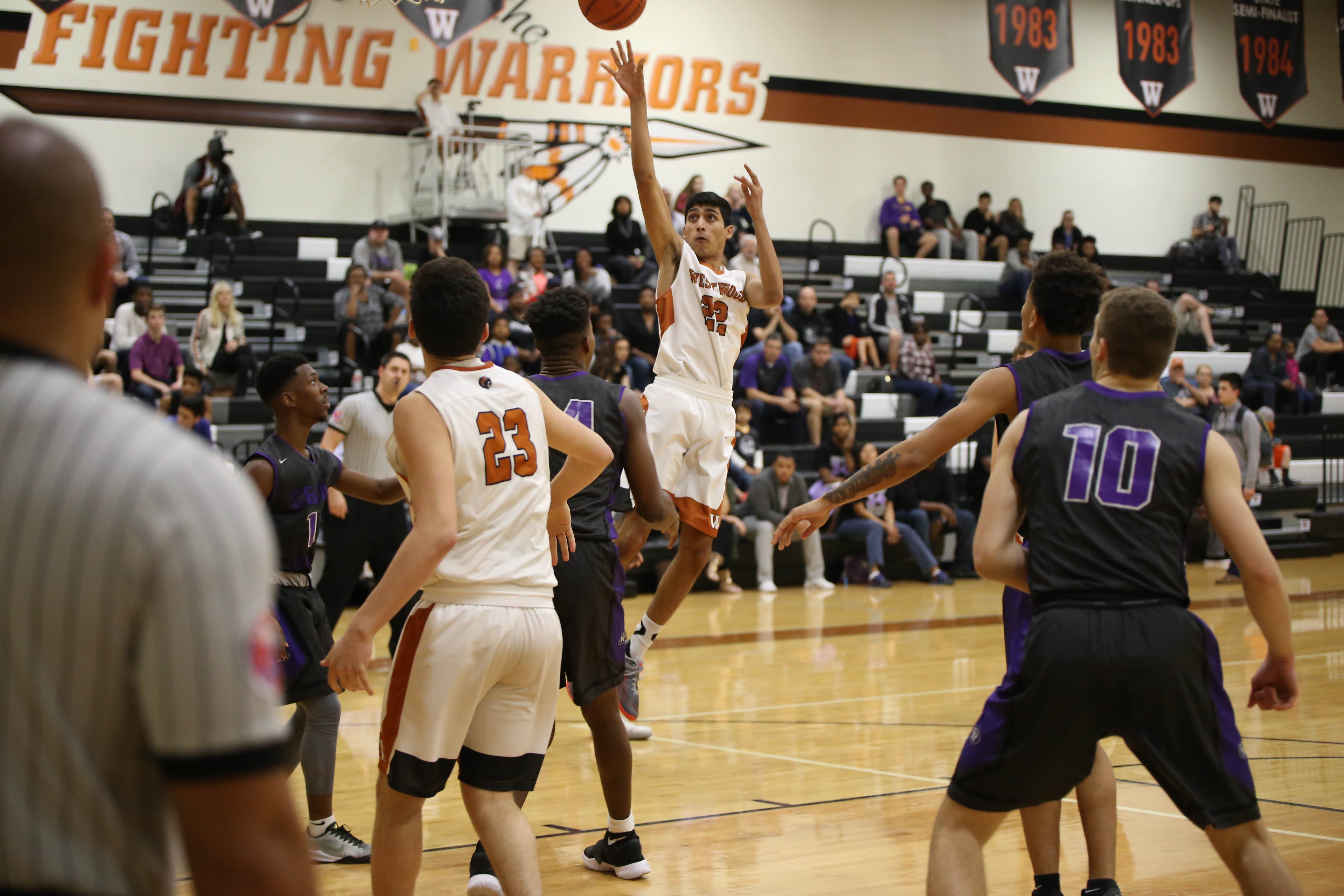 GALLERY: Varsity Boys' Basketball Falls to Cedar Ridge 39-53