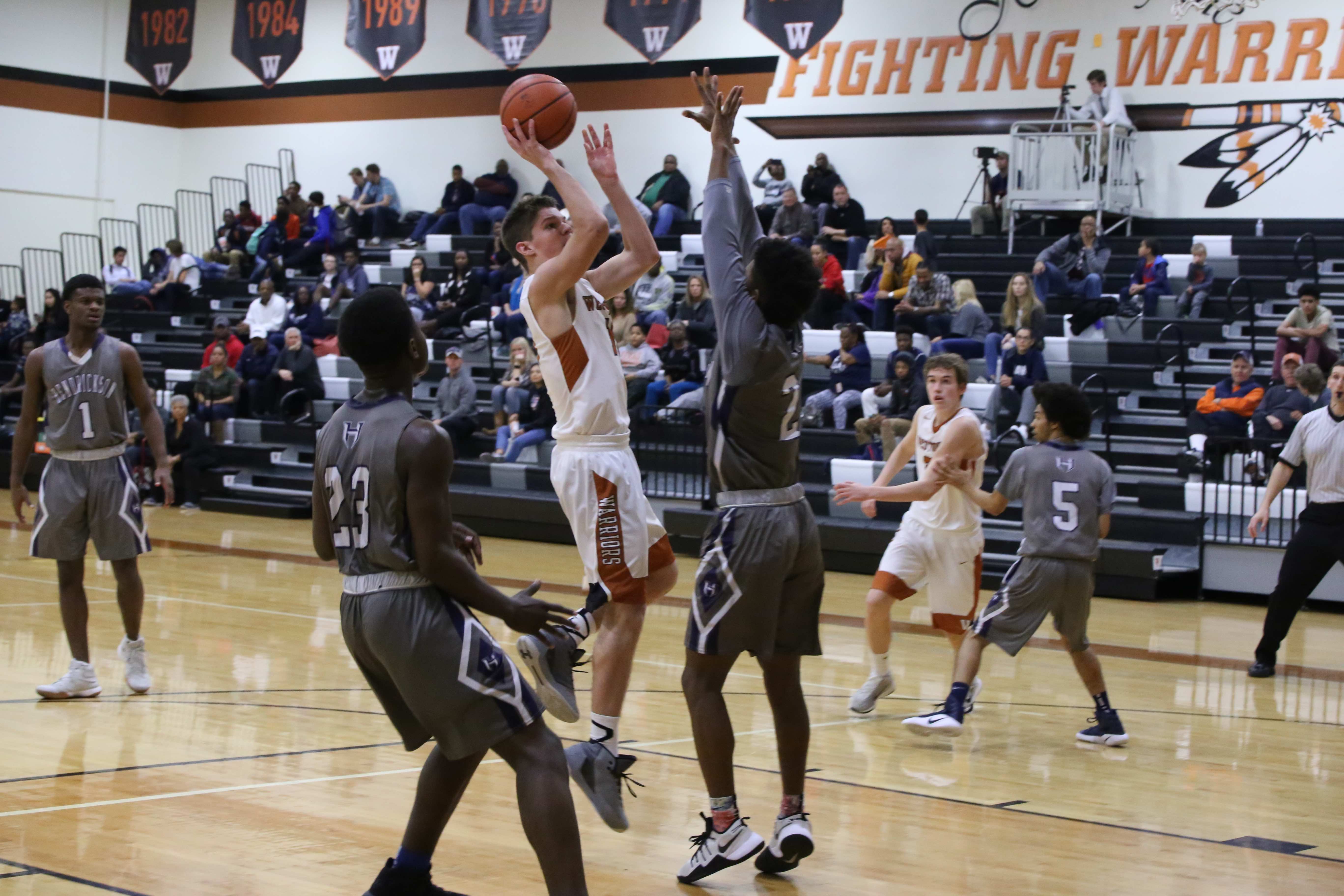 GALLERY: Varsity Boys' Basketball Falls Short Against Hendrickson