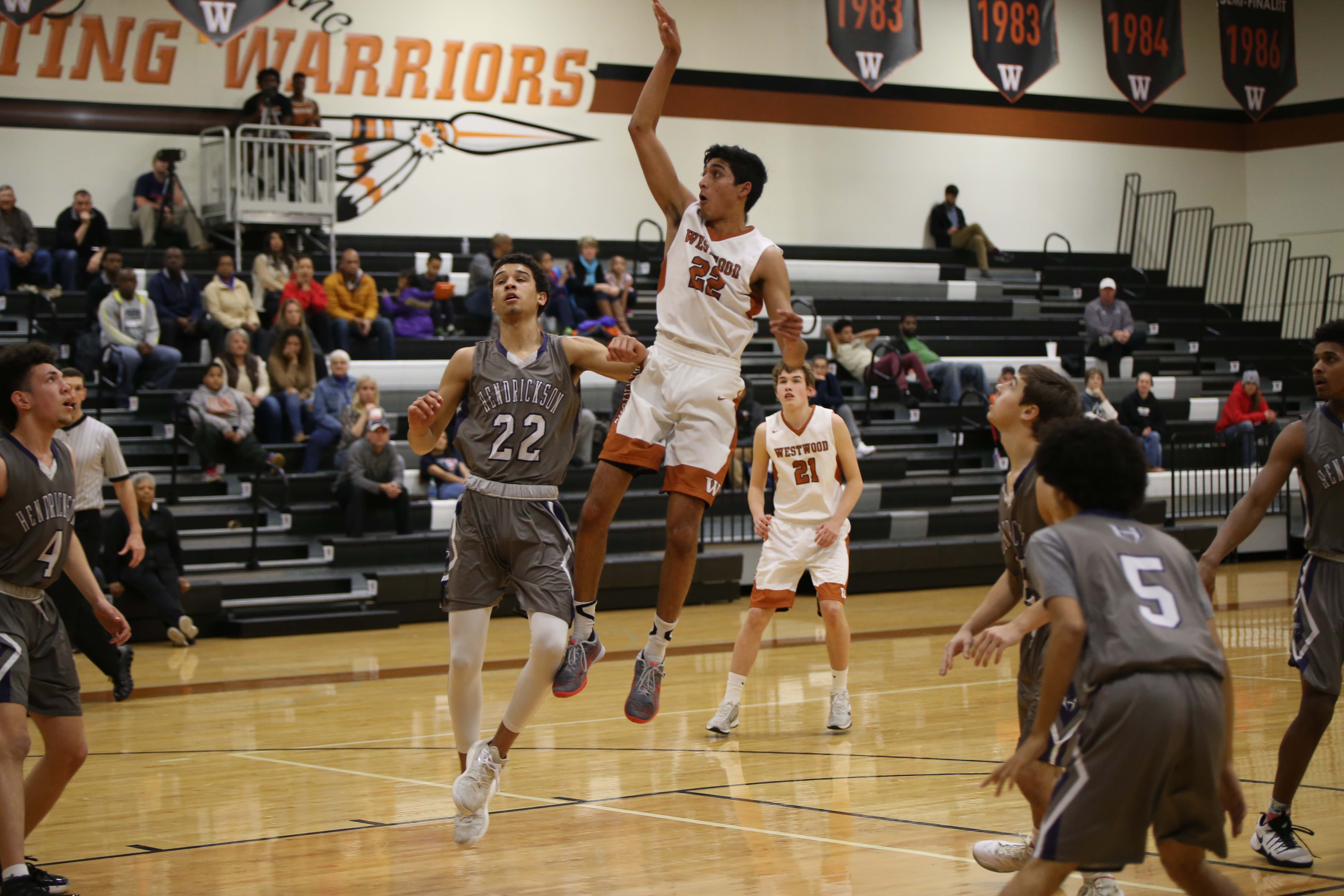 GALLERY: Varsity Boys' Basketball Falls Short Against Hendrickson