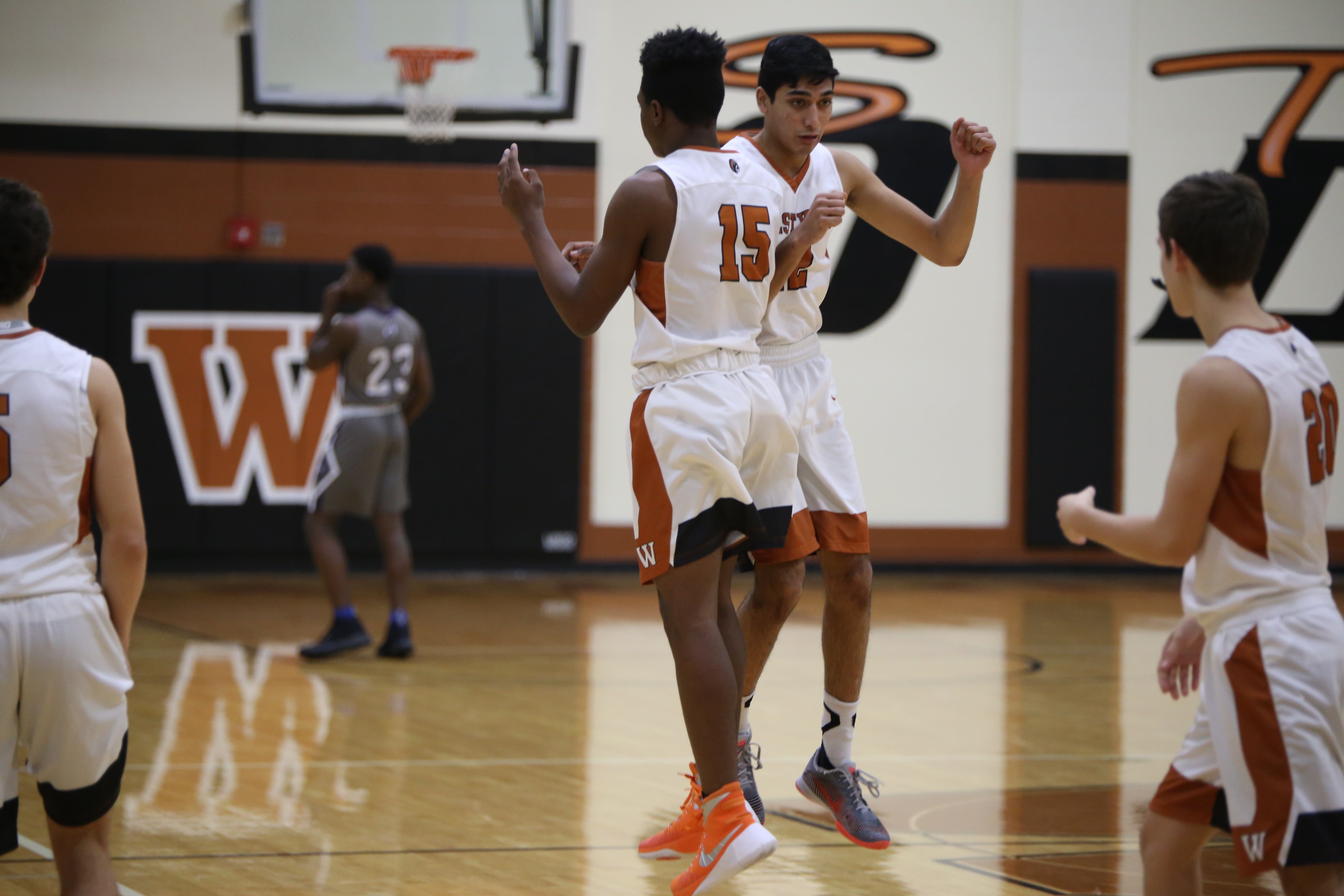 GALLERY: Varsity Boys' Basketball Falls Short Against Hendrickson