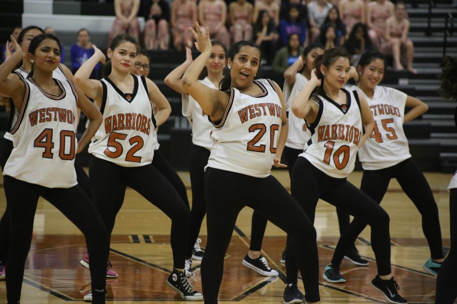 Srija Reddy 18 Poses with members of warrior pride during a hip-hop dance.