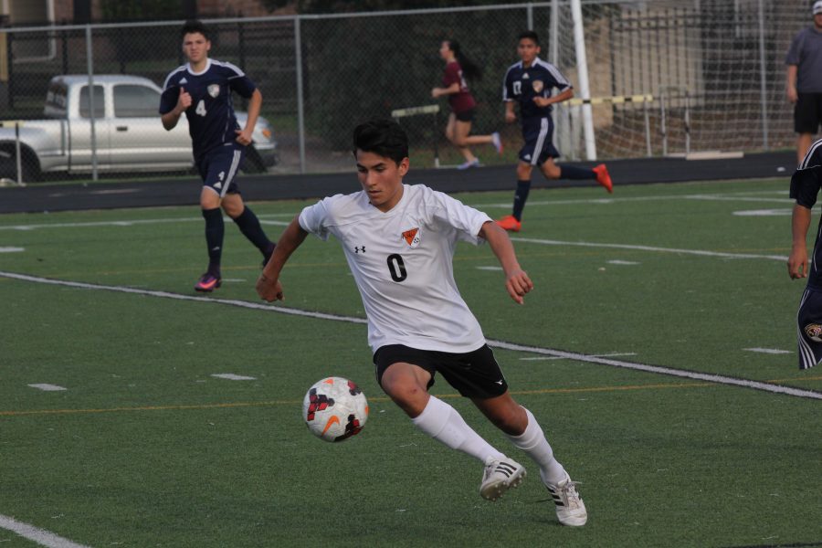 Daniel Lobera 19 pushes forward, on his way to score another goal.