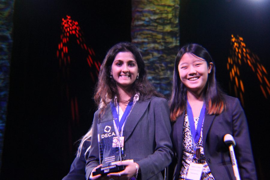 Tanvi Ingle 18 and Catherine Li 18 pose after receiving their award.