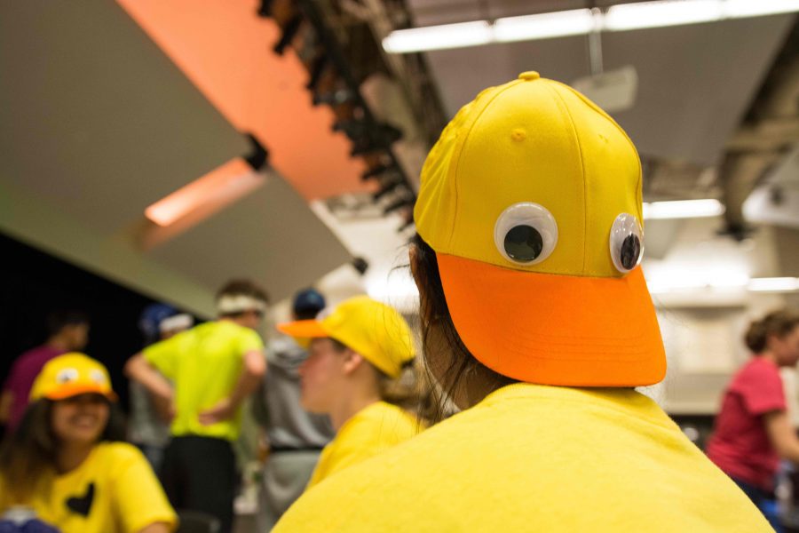 Students wear duck hats as team costumes.