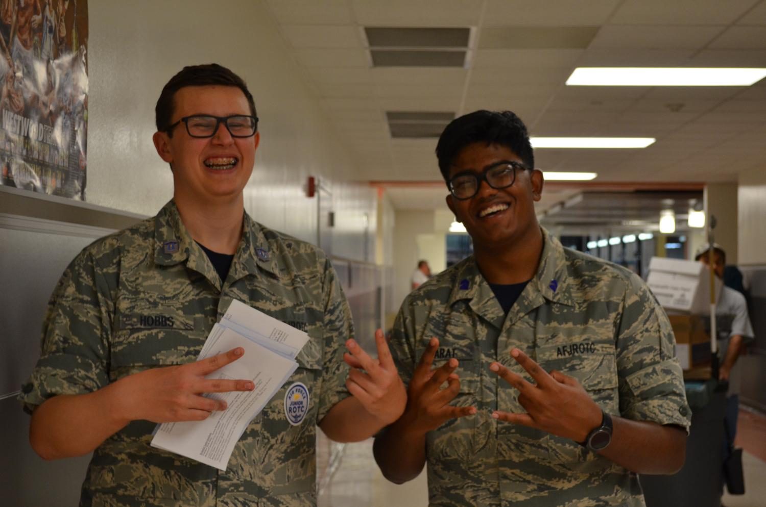 Mitchell Hobbs ’20 and Ronan Karat ’19
AFROTC students smile after helping guide several parents to their classrooms.