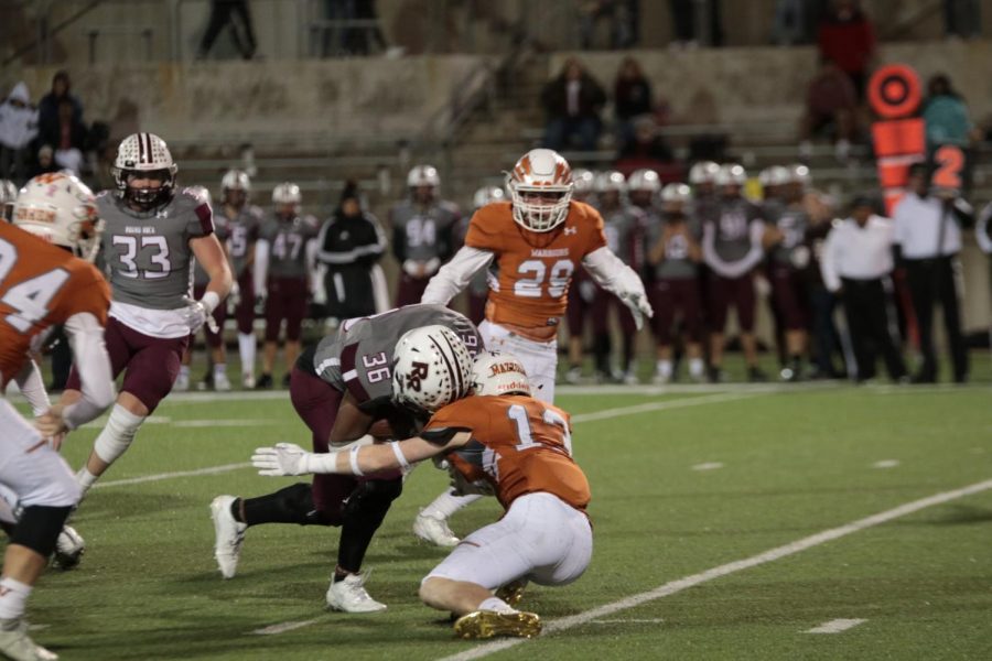 Luca Mazzola 19 cuts and tackles Round Rock wide receiver.
