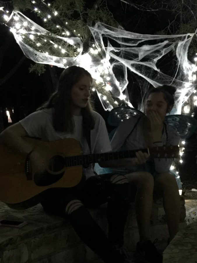 Sophomores Rachel Rusch and Kylie Chesebro play and sing songs together