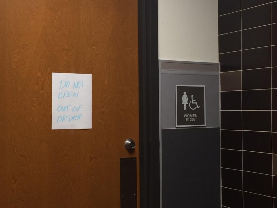 A sign marks the bathroom where the second trashcan fire was set.