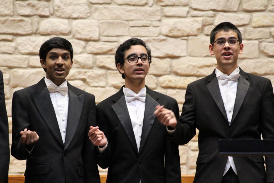 Dhruva Mambapoor 18, Neal Gandhi 18, and Ostric Nagle 18 sing to Tiny Little Baby