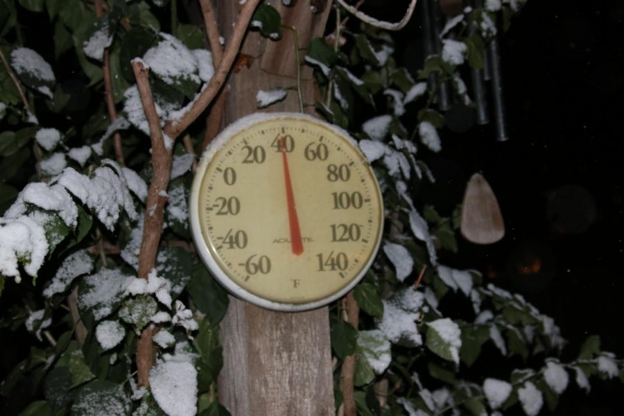 A thermometer displays the frosty conditions.