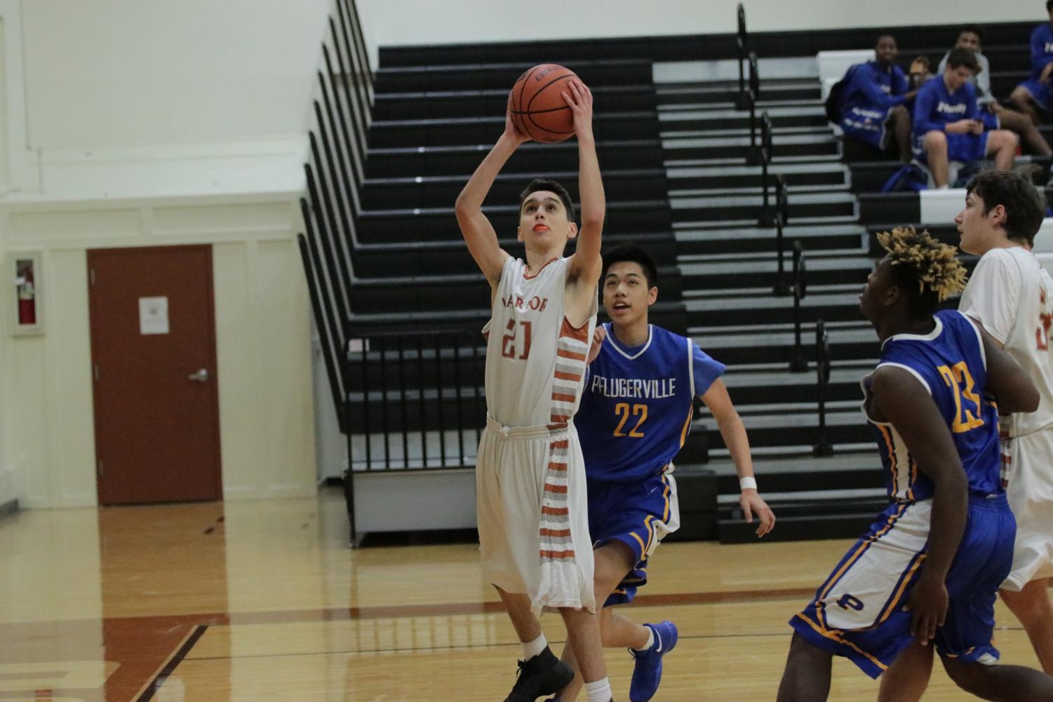 GALLERY%3A+JV+Boys+Basketball+Conquers+Pflugerville+Panthers+51-47
