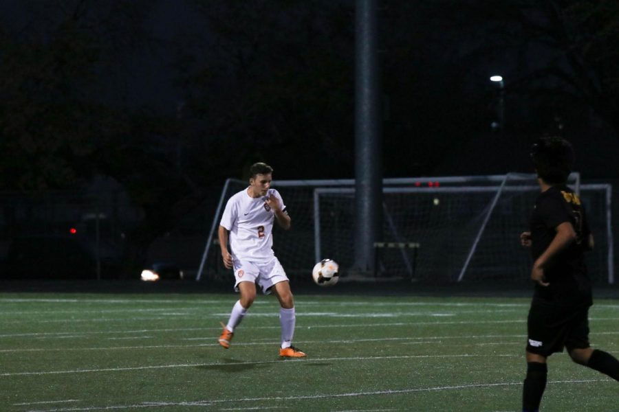 Zach Siegel 19 controls the ball passed back by a teammate.
