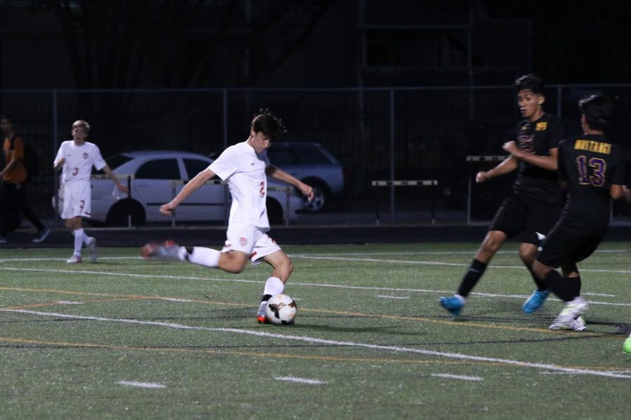 Anthony Bibbo 20 strikes the ball and scores the first goal for the Warriors.