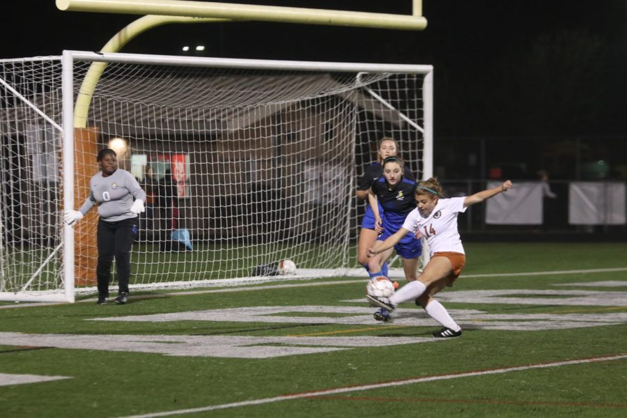 Christina Stephenson 18 takes a shot on goal in the second half. 