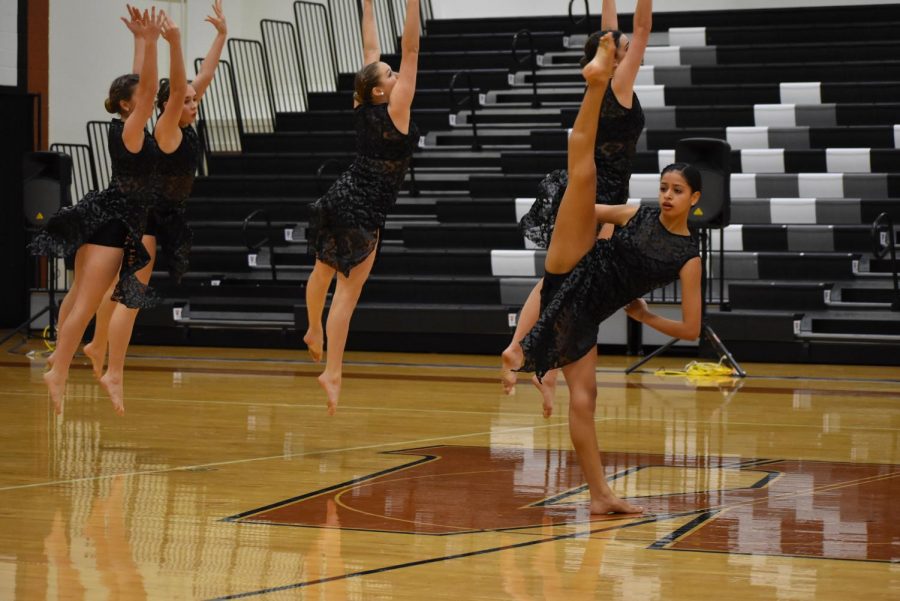 Line Officer Susi Chavez 19 executes a tilt as part of her solo. 